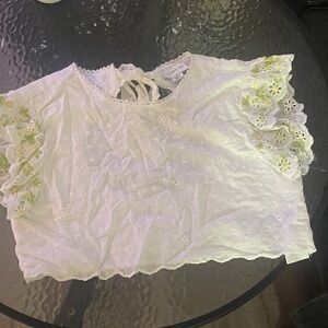 Chic White Eyelet Blouse with Green Floral Accents